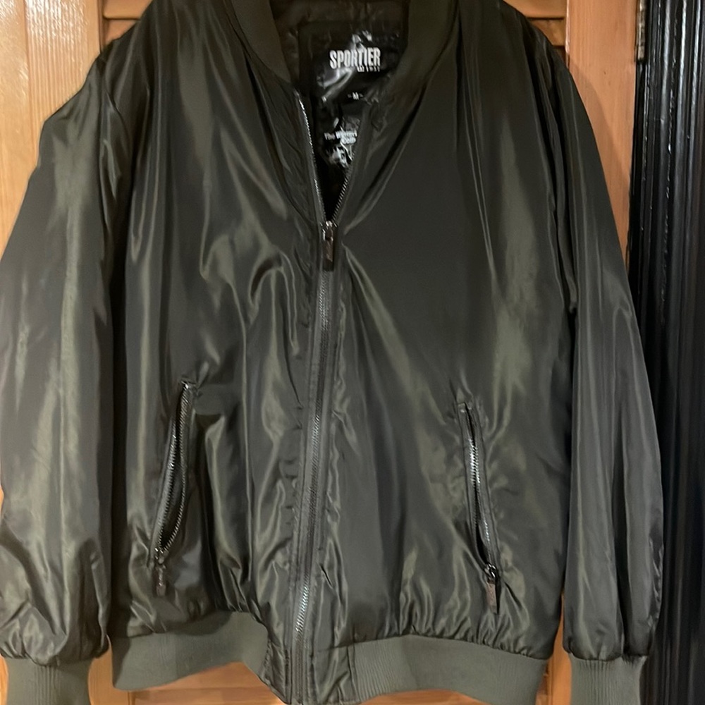 Olive green nylon bomber jacket in excellent condition, size medium